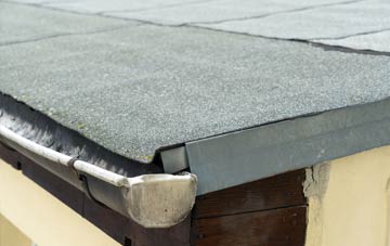 repair or replace Ladies Riggs flat roofing?
