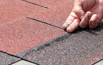 Ladies Riggs asphalt roof repairs
